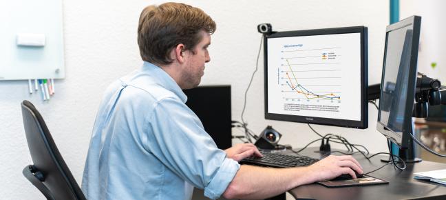 Person viewing data on a computer.