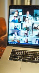 Virtual meeting on a laptop.