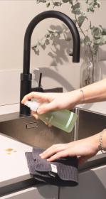 Person cleaning a counter