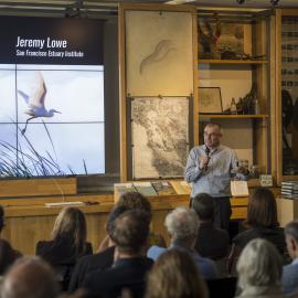 man presenting a slide